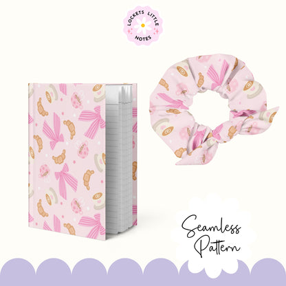 Seamless pattern featuring hand-illustrated coffee mugs with latte art, flaky golden croissants, and delicate pink-and-white striped bows on a soft pastel pink background.