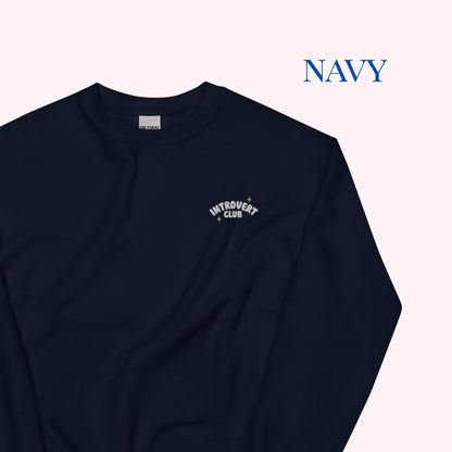 Navy long-sleeve shirt with 'Introvert Club' embroidery on a white background