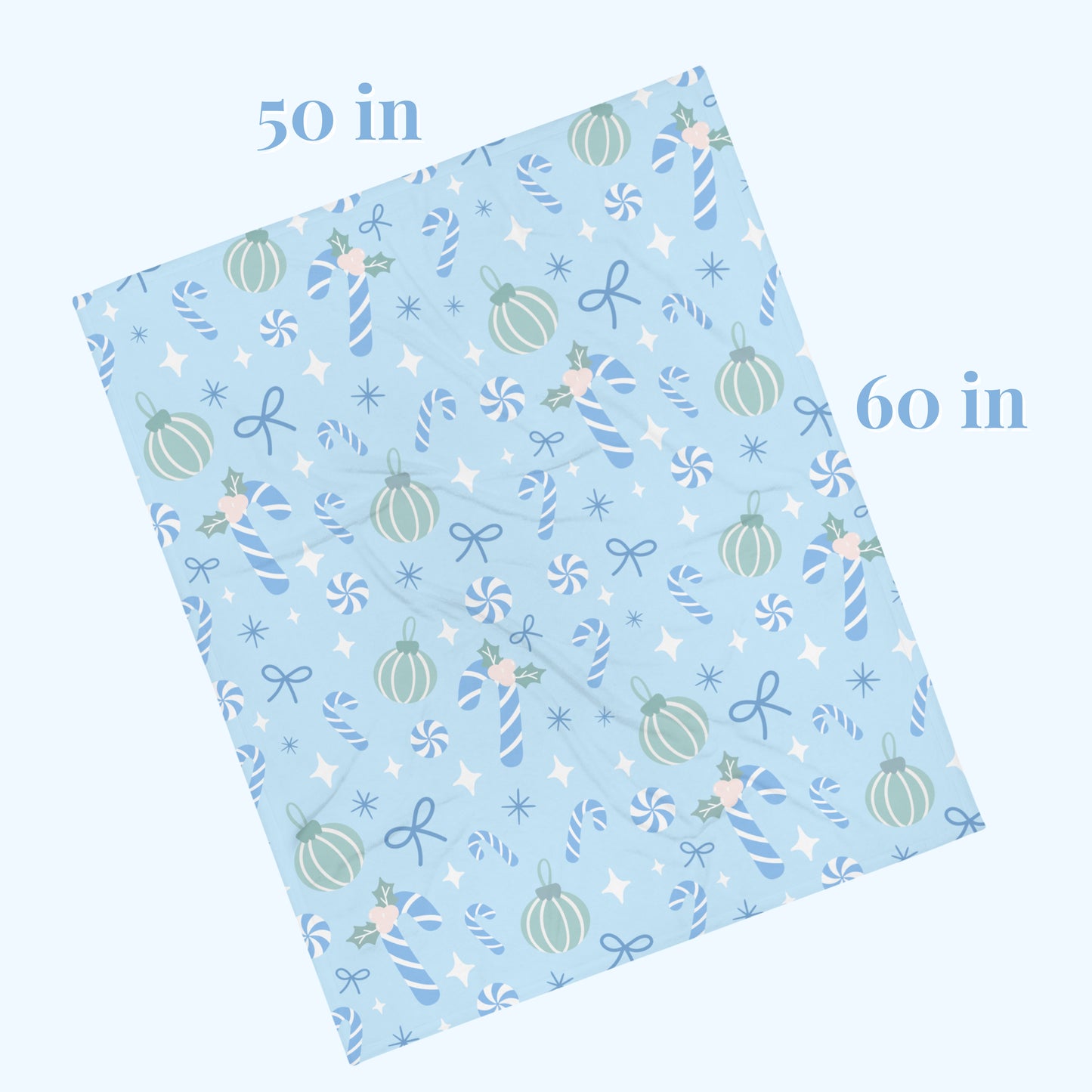 Blue Blanket with festive patterns and measurements on a white background