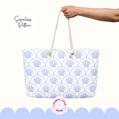 Seamless coastal pattern featuring a crisp white background with a repeat layout of indigo blue clam shells and decorative blue scallop designs.Tote bag with shell pattern held by a hand on a white background