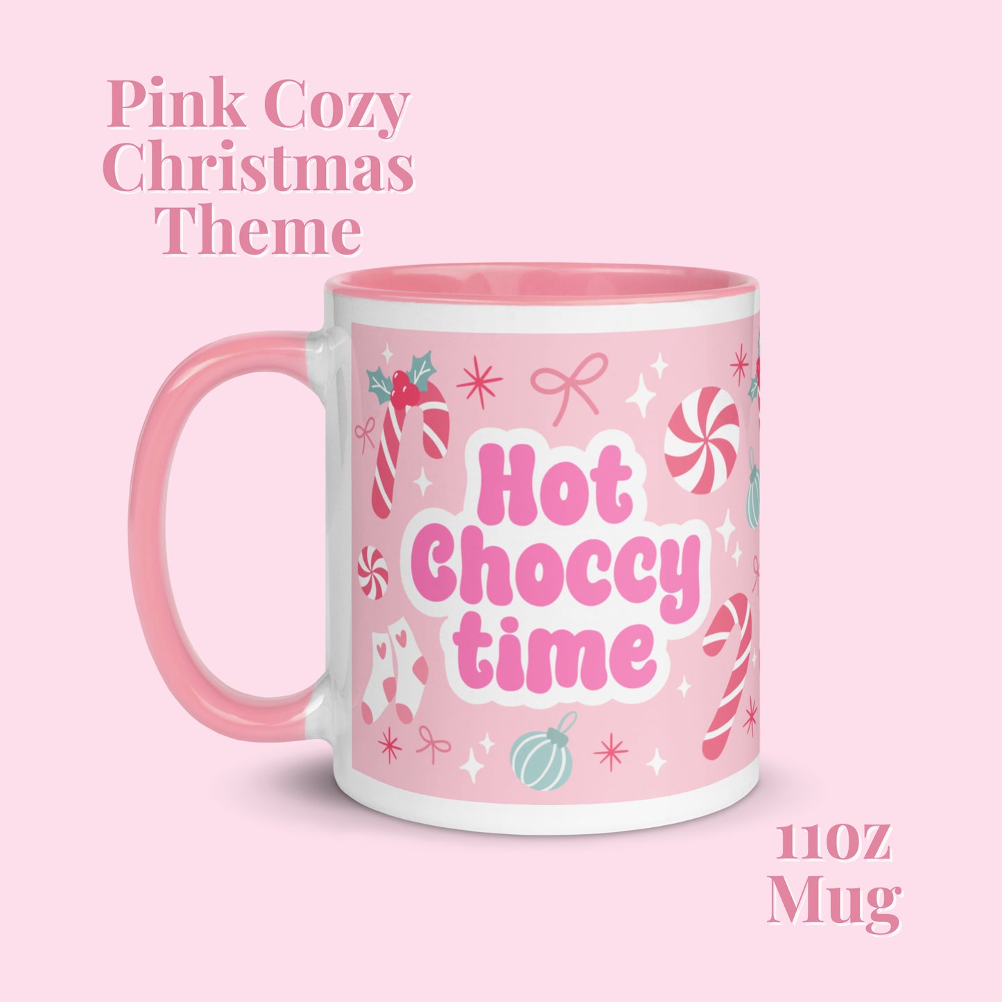 Pink Mug with a christmas pattern and hot choccy time motif on a light pink background