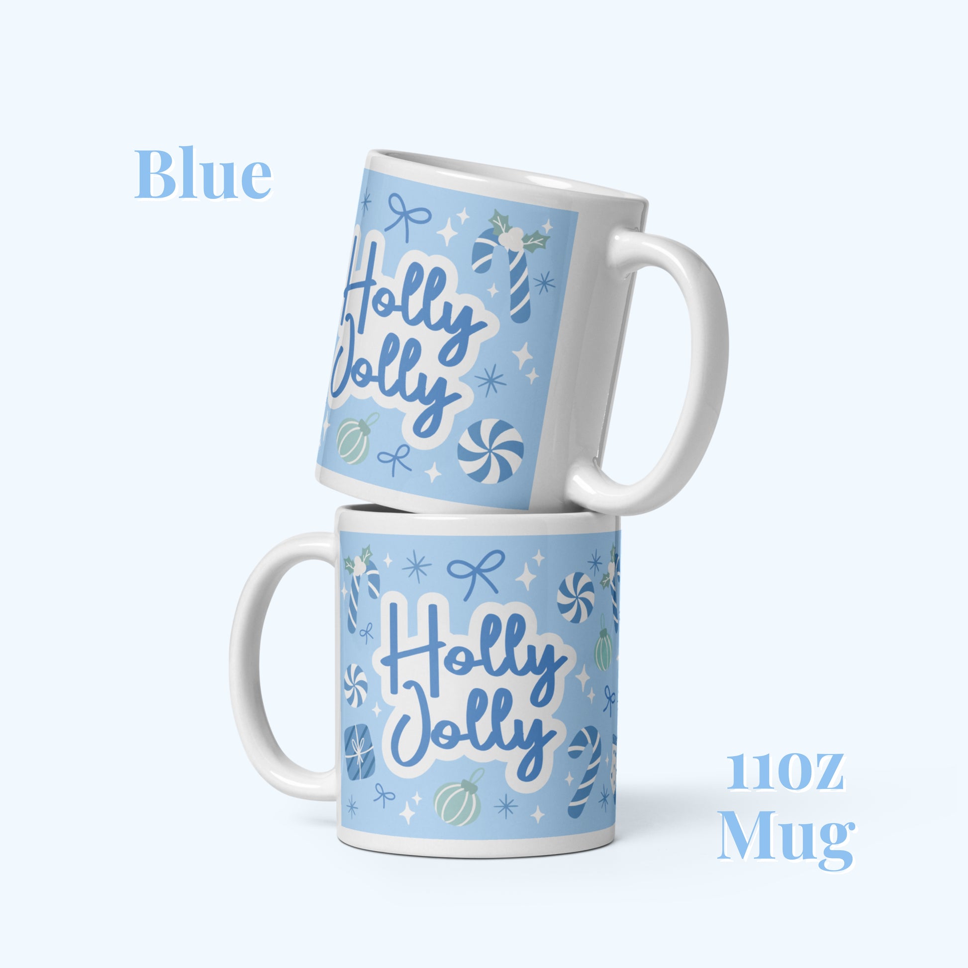 Blue mug with christmas patterns including blue candy canes. and a holly jolly motif on a light blue background