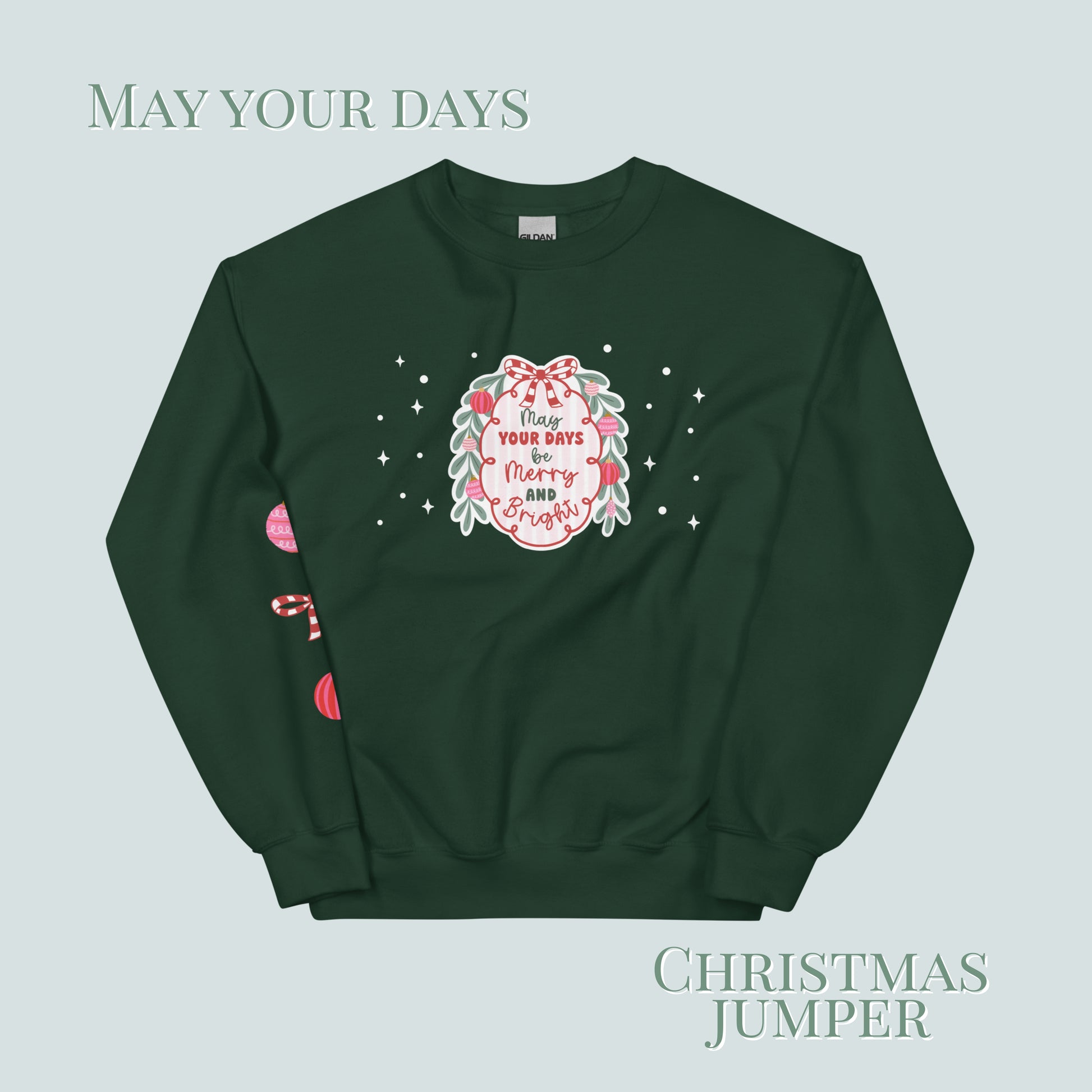 Green Christmas sweater with festive design and text on a light green background