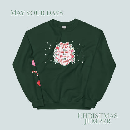 Green Christmas sweater with festive design and text on a light green background