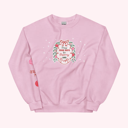 Pink sweatshirt with Christmas design and text on a white background