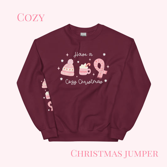 Maroon Christmas sweater with pink graphics and text on a white background